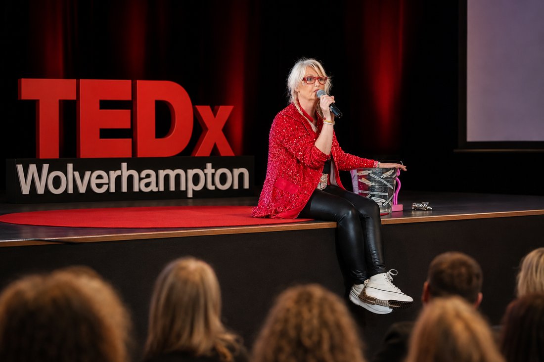 Jules Mitchell speaking on the TEDx Wolverhampton stage
